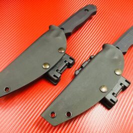 a Scout Style Kydex Sheath For The Benchmade Nimravus sitting on top of a red surface.