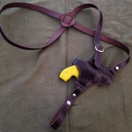a purple Handmade Leather Shoulder Holster with a yellow banana on it.