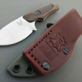 A Vertical Kydex Sheath for Benchmade Hidden Canyon Hunter and knife sitting next to each other.