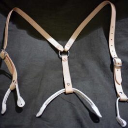 Handmade Leather Suspenders on a black background.