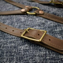 An Upgraded Leather Suspenders with a gold buckle.