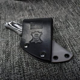 A Black Vertical Kydex Sheath for Benchmade Hidden Canyon Hunter sitting on top of a Gray Carpet.