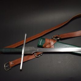 a Custom Wood Core Scabbard and a leather strap.