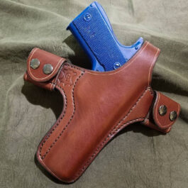 A Handmade Leather Snap Loop Pancake Holster with a blue handle.