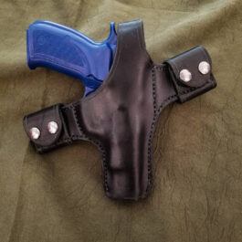 a Handmade Leather Snap Loop Pancake Holster with a blue handle.