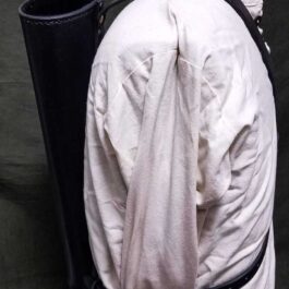 The Basic Back Quiver on a person wearing a white suit.
