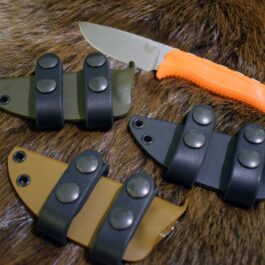 a Kydex sheath for the Benchmade Steep Country on a furry surface.