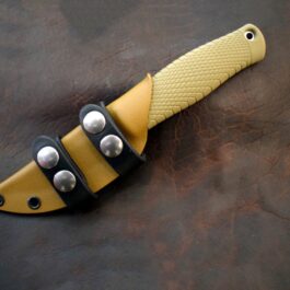 Kydex Sheath for the Benchmade Puukko laid on a cloth- renaissance clothing - renaissance clothing men - renaissance clothing women - renaissance clothing near me - renaissance art clothing - renaissance era clothing - renaissance costume ideas