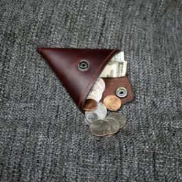 a brown handmade leather coin pouch