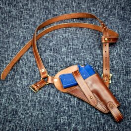 a brown leather belt with a blue tool in it.