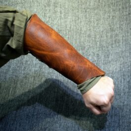 A man's arm with Soft Leather Mirkwood Vambraces.