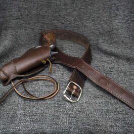 A Buscadero Gunbelt and a brown leather strap.