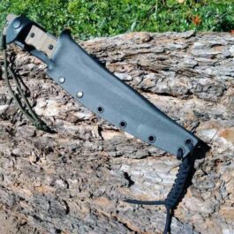 The Kydex Sheath for the TOPS Wild Pig Hunter is sitting on a tree stump.