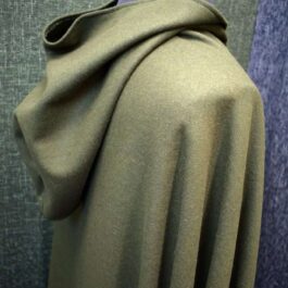 A mannequin dressed in a Wool Hooded Cloak.