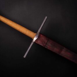 A Handmade leather Scabbard for the Albion Liechtenauer with a wooden handle on a black background.