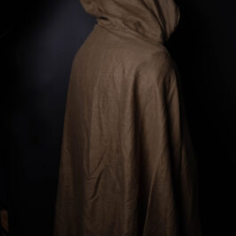 a person in a Wool Hooded Cloak in the dark.