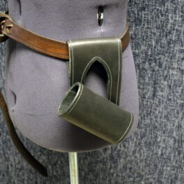 A close up of a mannequin's head with a Handmade Leather Sword Hanger.