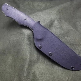 A Kydex Sheath for the Benchmade Fixed Contego that is laying on a cloth.