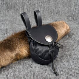 a black leather Small Sporran Belt Pouch with a fur tail.
