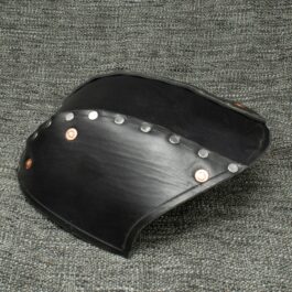 A close up of Riveted Leather Back Of the Head Protection on a gray surface.