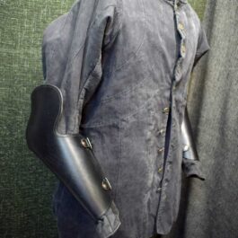 A mannequin dressed in a Handmade leather Bazuband Style 2 outfit.