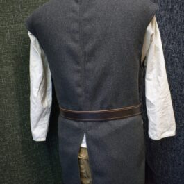 The back of a man's Wool Ranger Jerkin and white shirt.