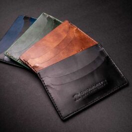 A Front Pocket Card Wallet with four different colors of leather.