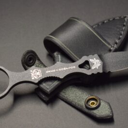 a black pocket knife with a Handmade Leather Sheath for the Benchmade Mini SOCP Dagger.