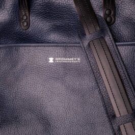 a close up of a Horween Leather Briefcase Satchel.