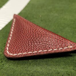 A close up of NFL Leather Finger Football.