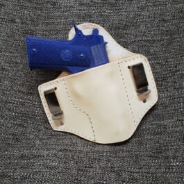 Handmade Leather Inside The Waistband Holster with a blue gun in it.