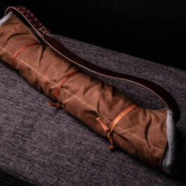 A Ranger Bedroll sitting on top of a couch.
