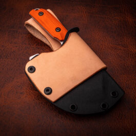 A Kydex sheath for the Benchmade Anonimus with a knife in it.