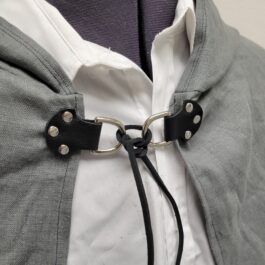 a close up of a person wearing a jacket and tie.
