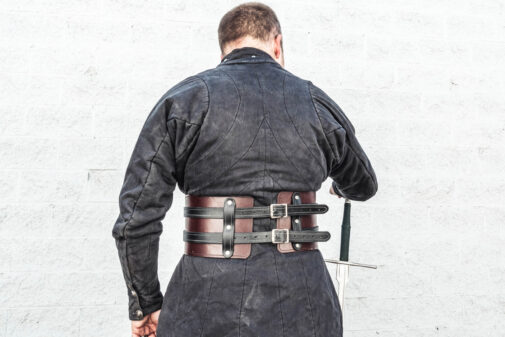 The rear view of a man wearing a kidney belt